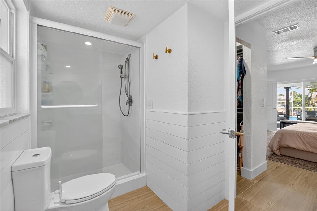 6337 Cocoa Lane Apollo Beach, FL 33572 - Photo 18 of 39 a bathroom with a shower and toilet