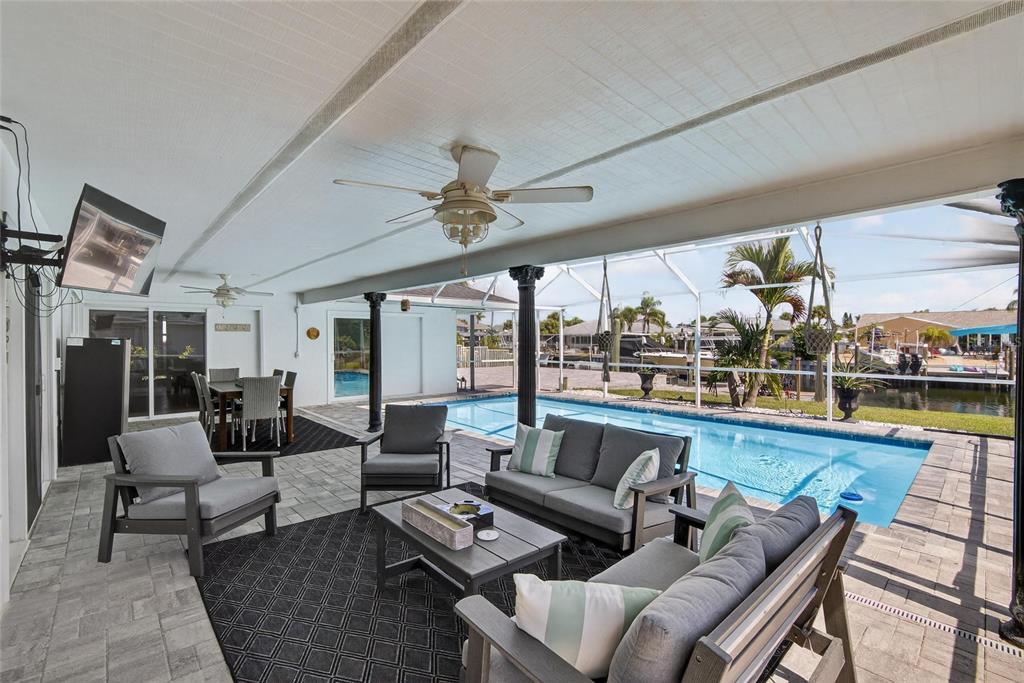 6337 Cocoa Lane Apollo Beach, FL 33572 - Photo 2 of 39 a living room with furniture and a large window