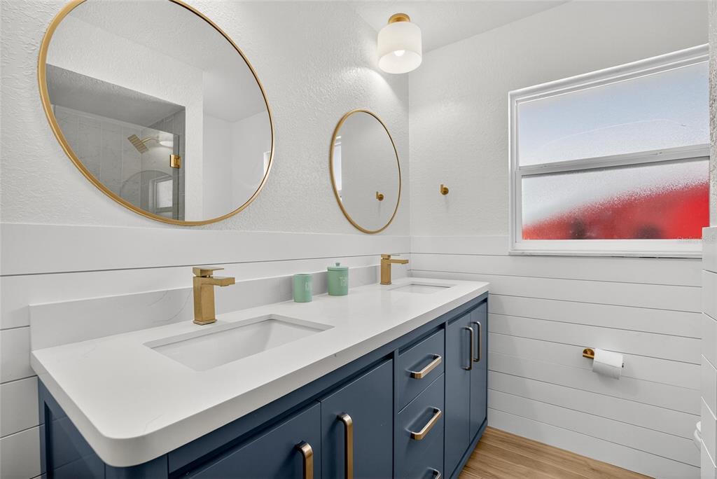 6337 Cocoa Lane Apollo Beach, FL 33572 - Photo 23 of 39 a bathroom with a sink and a mirror