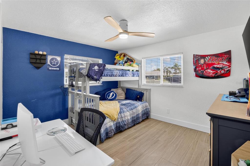6337 Cocoa Lane Apollo Beach, FL 33572 - Photo 24 of 39 a bed room with a bed and a couch
