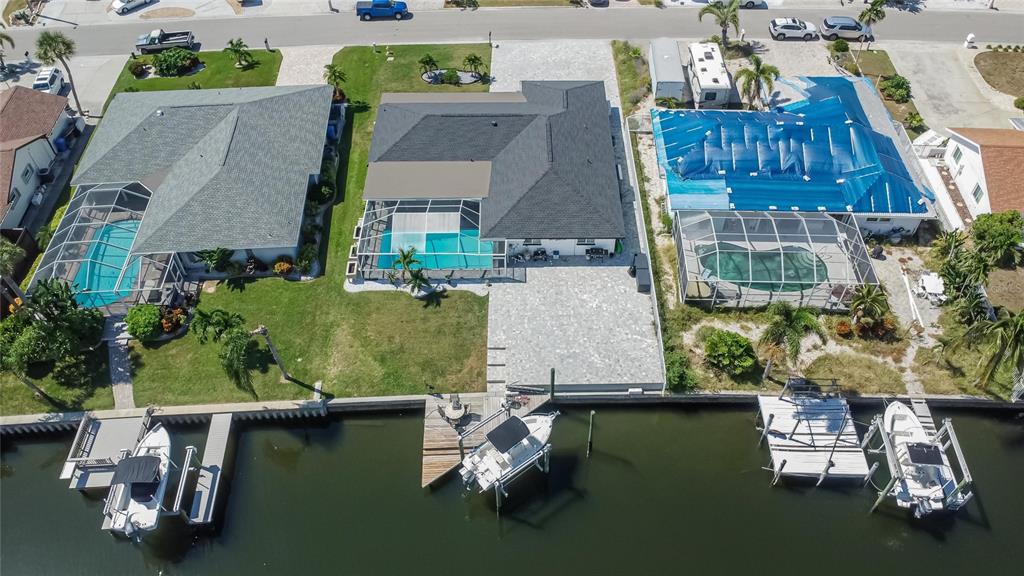 6337 Cocoa Lane Apollo Beach, FL 33572 - Photo 33 of 39 an aerial view of a house with swimming pool outdoor seating and yard