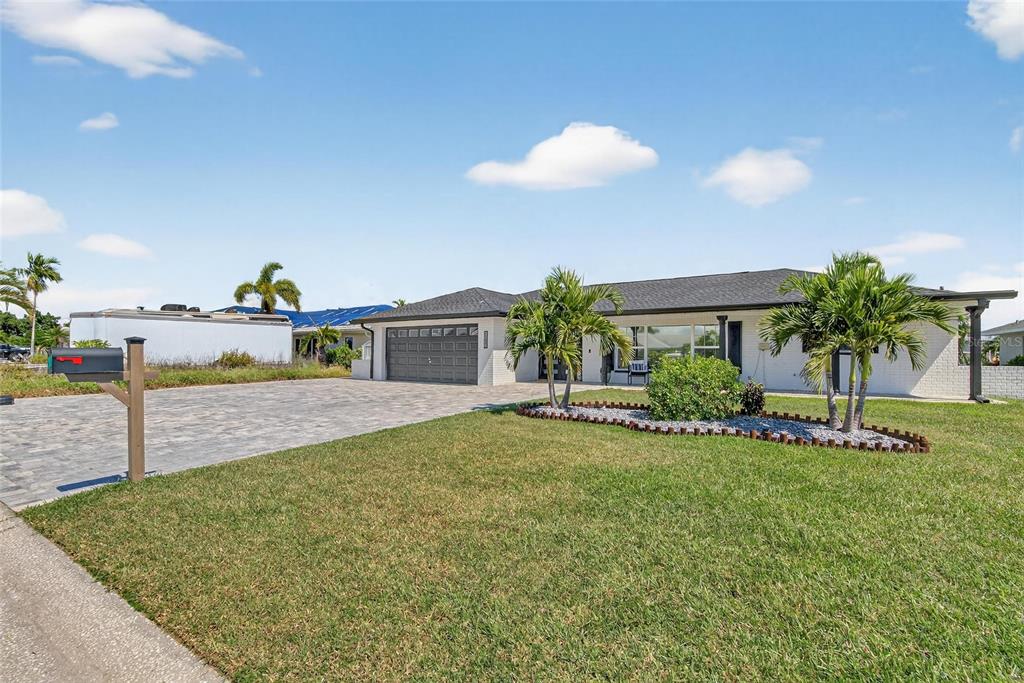 6337 Cocoa Lane Apollo Beach, FL 33572 - Photo 36 of 39 a view of a house with backyard and sitting area