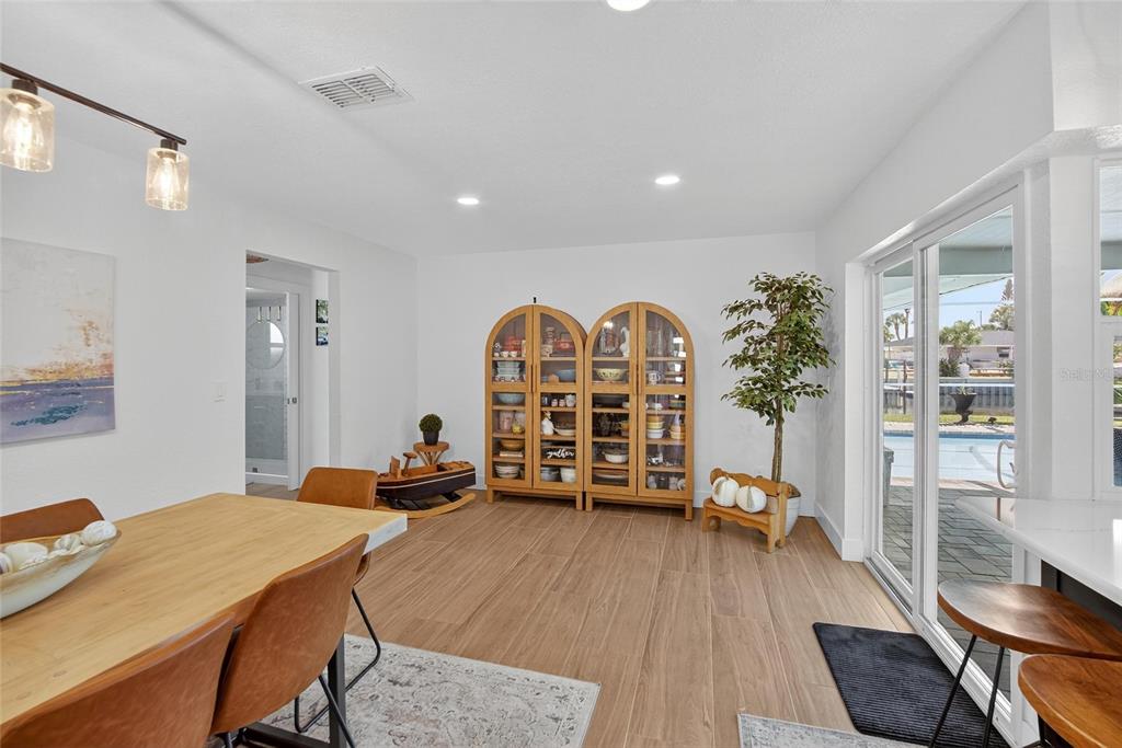 6337 Cocoa Lane Apollo Beach, FL 33572 - Photo 8 of 39 a room with furniture and a wooden floor