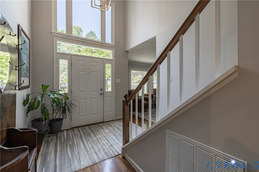 4501 Foxwood Road Chester, VA 23831 - Photo 18 of 42 Two-story foyer with a paneled entry door, sidelig