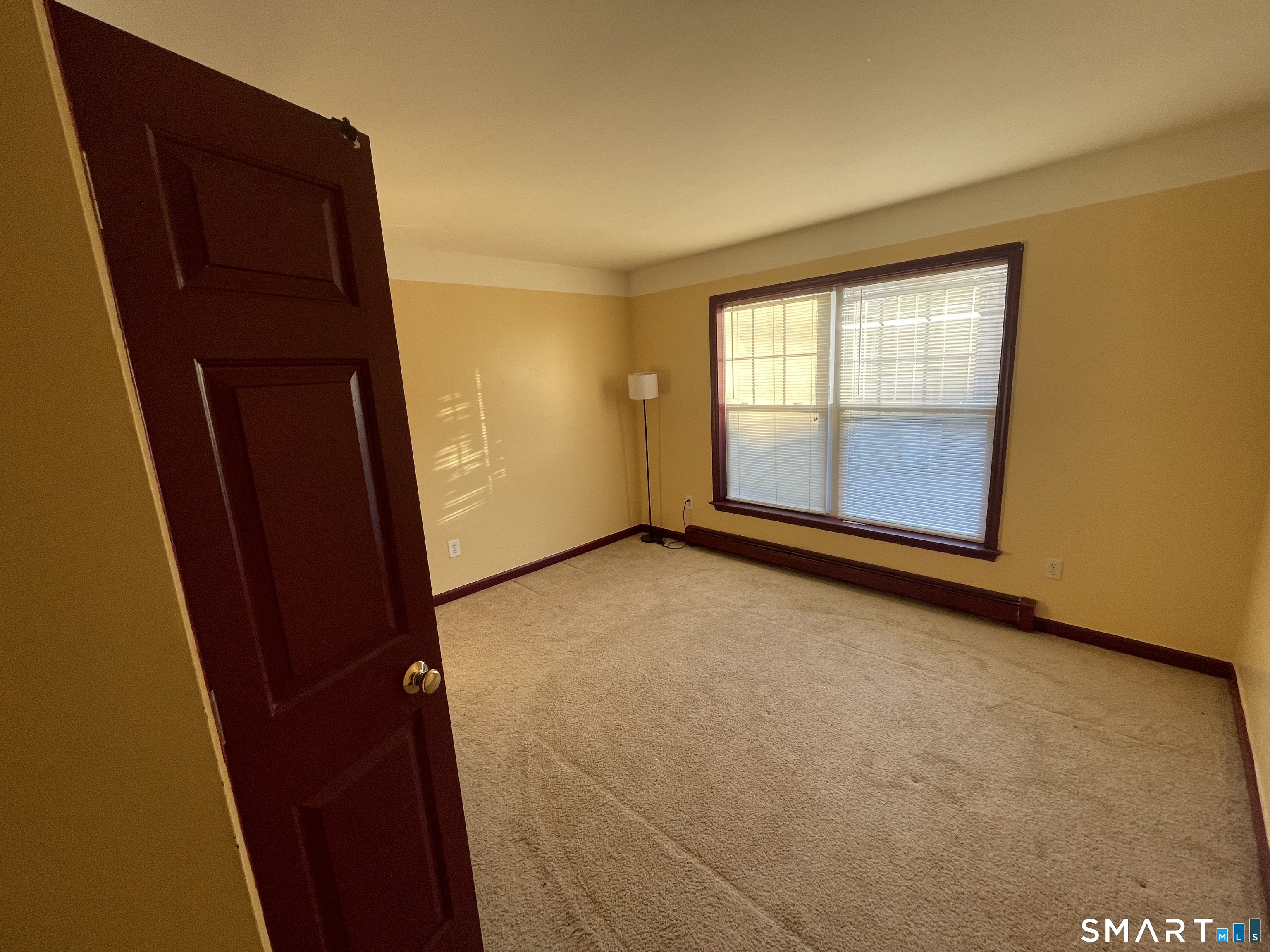11 Button Street New Haven, CT 06519 - Photo 13 of 18 an empty room with windows