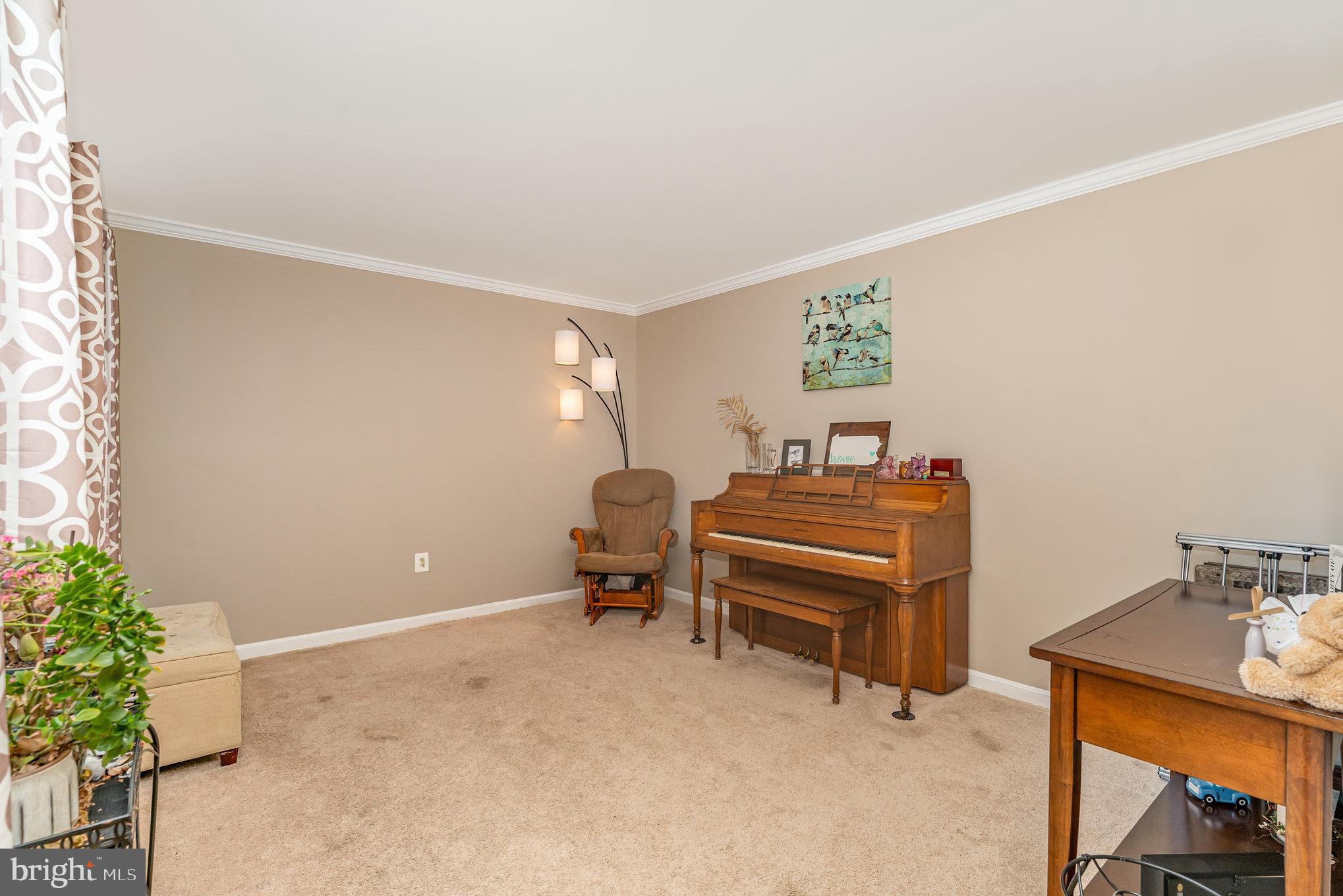 6139 Schooner Circle King George, VA 22485 - Photo 13 of 29 a room with a table and a chair