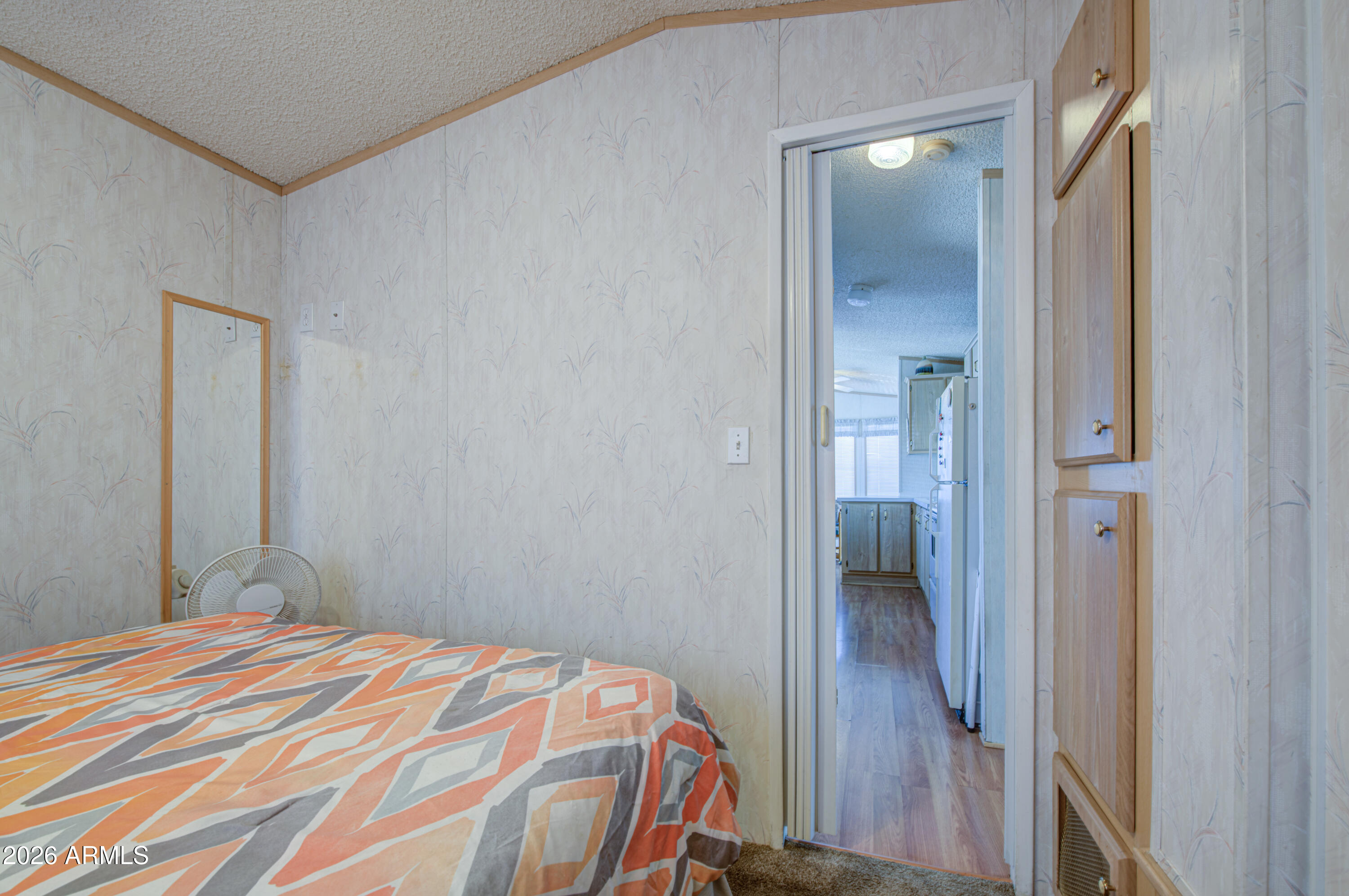 7750 East Broadway Road, Unit 273 Mesa, AZ 85208 - Photo 15 of 36 a bedroom with a bed and bathroom