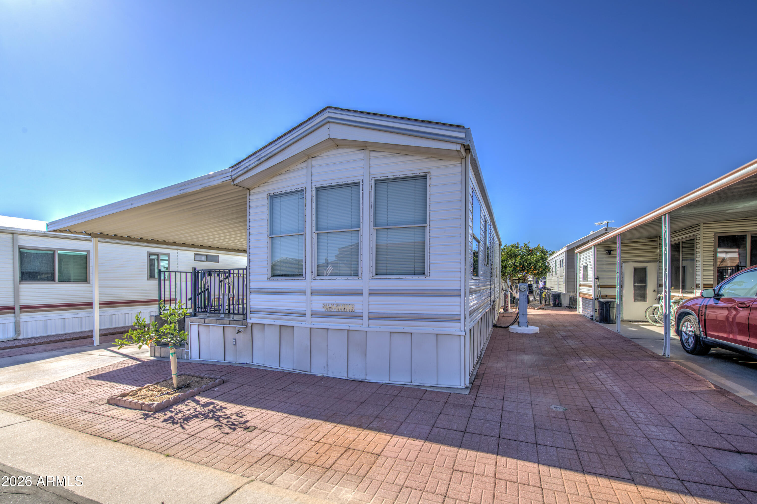 7750 East Broadway Road, Unit 273 Mesa, AZ 85208 - Photo 22 of 36 a view of house with outdoor space