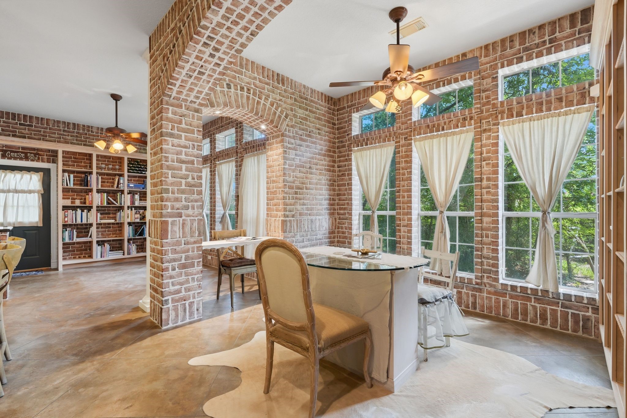 25014 Northampton Terrace Drive Spring, TX 77389 - Photo 13 of 41 The brickwork design is classy and cozy! And look at all those windows bringing in the sunlight!