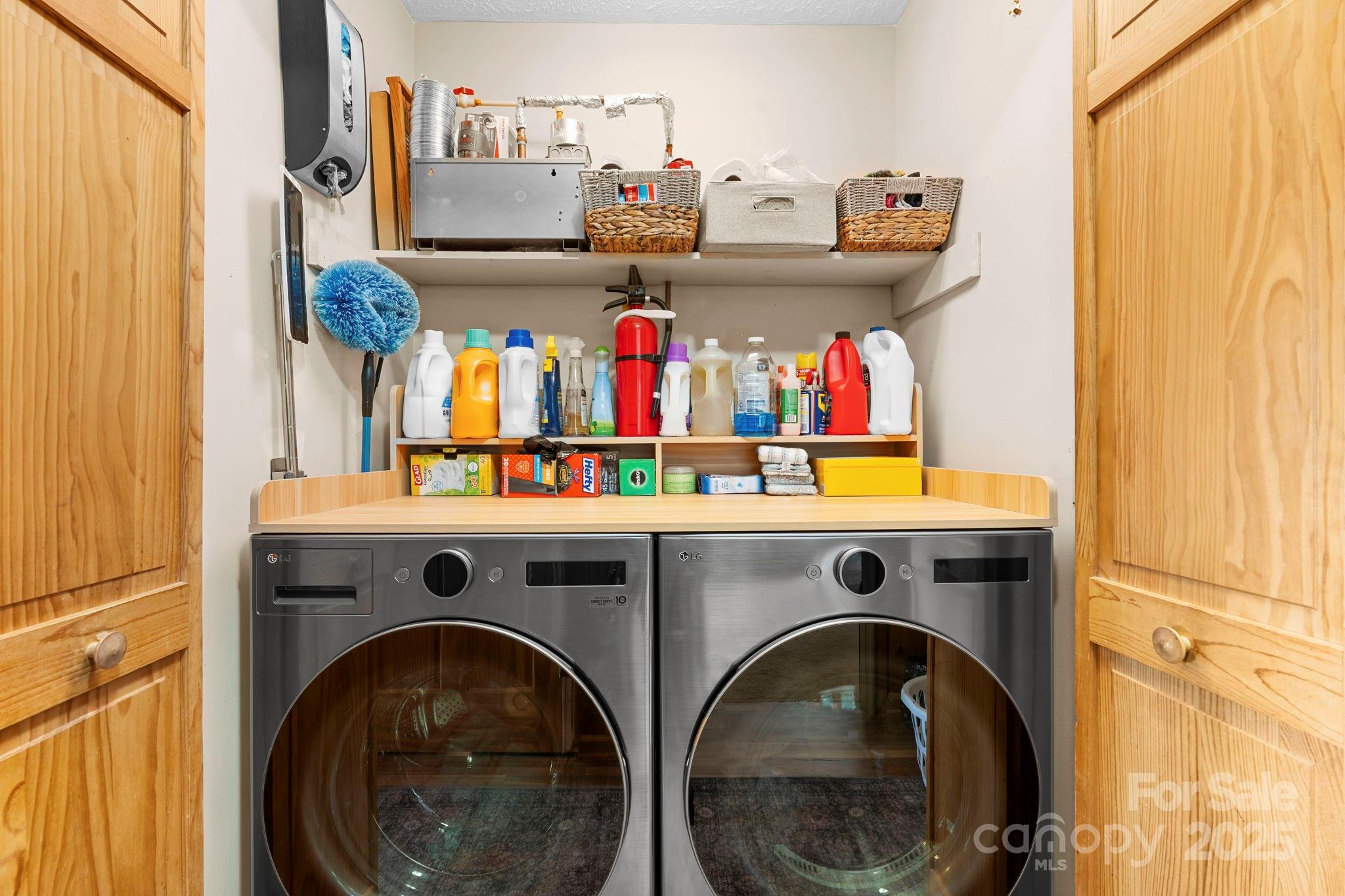 4415 Laurel Ridge Drive Lenoir, NC 28645 - Photo 19 of 48 a utility room with dryer and washer