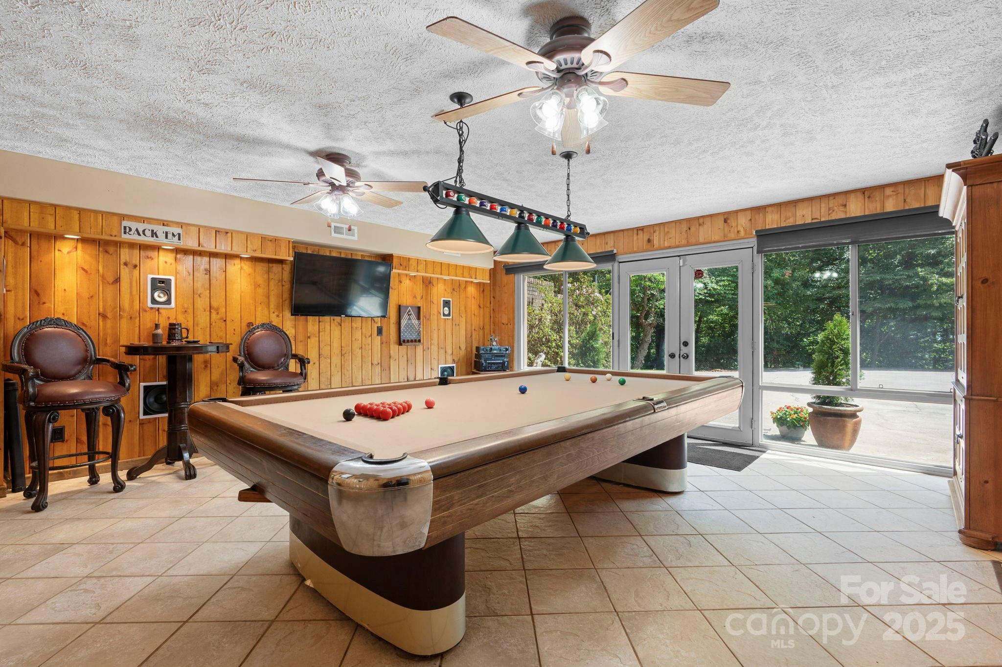 4415 Laurel Ridge Drive Lenoir, NC 28645 - Photo 25 of 48 a room with pool table and windows