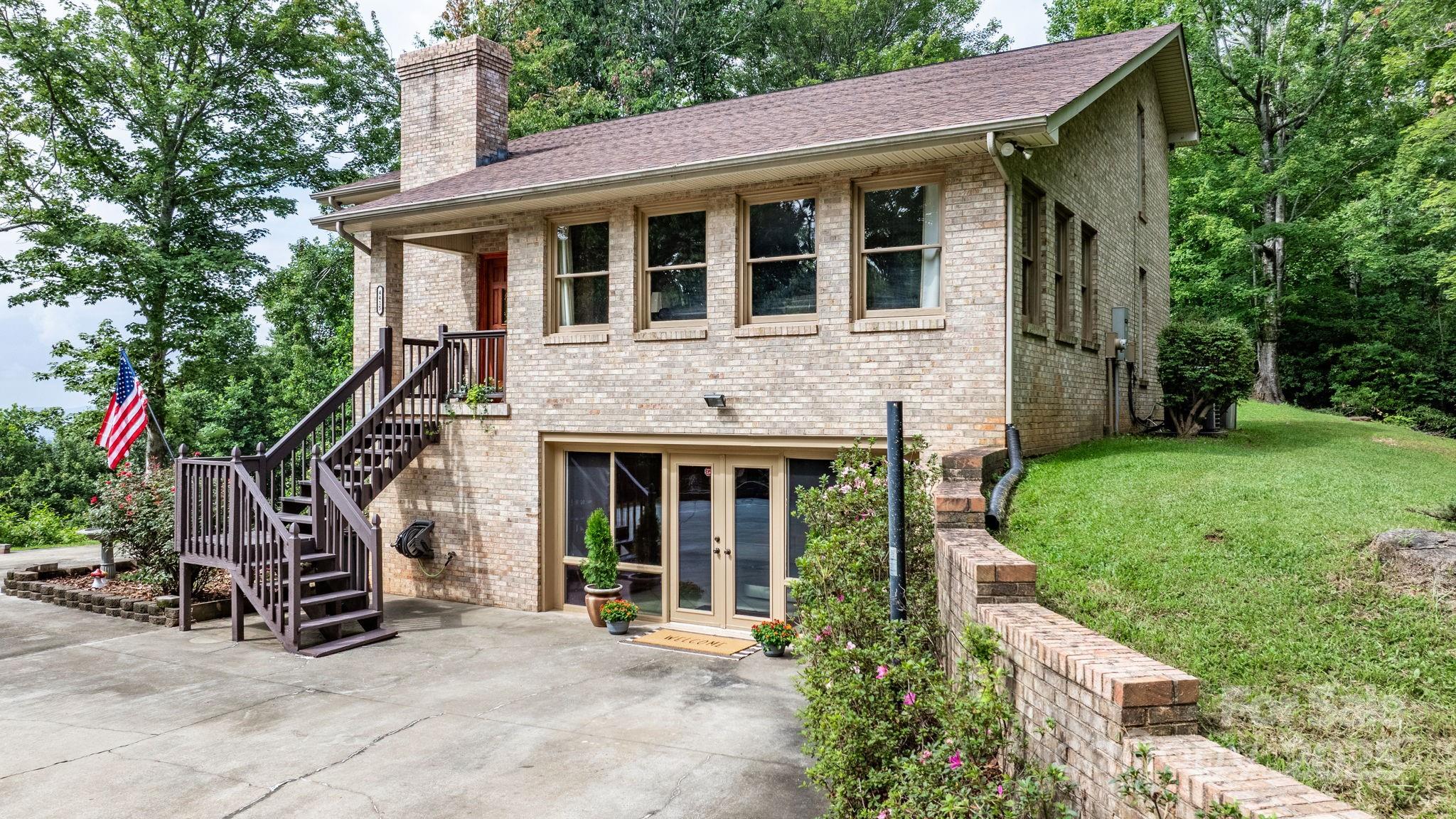 4415 Laurel Ridge Drive Lenoir, NC 28645 - Photo 38 of 48 a view of a house with yard and porch