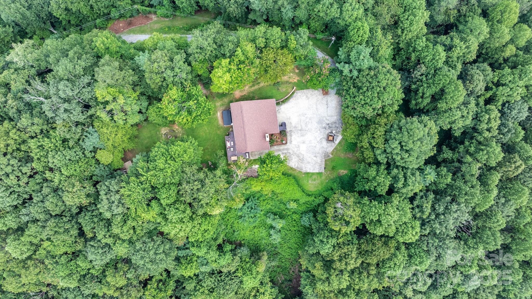 4415 Laurel Ridge Drive Lenoir, NC 28645 - Photo 43 of 48 an aerial view of a house with yard and outdoor space