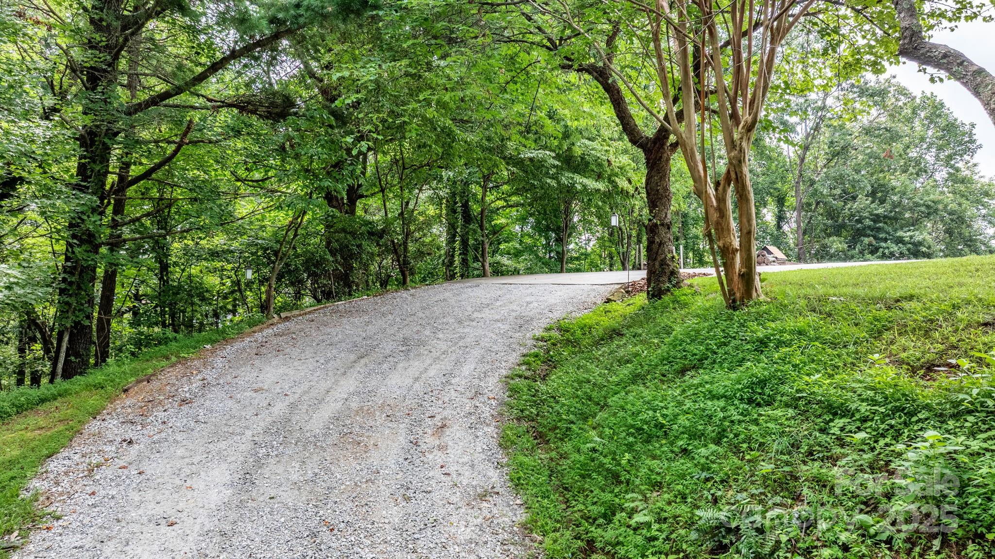 4415 Laurel Ridge Drive Lenoir, NC 28645 - Photo 47 of 48 a big yard with flowing stream of water in middle