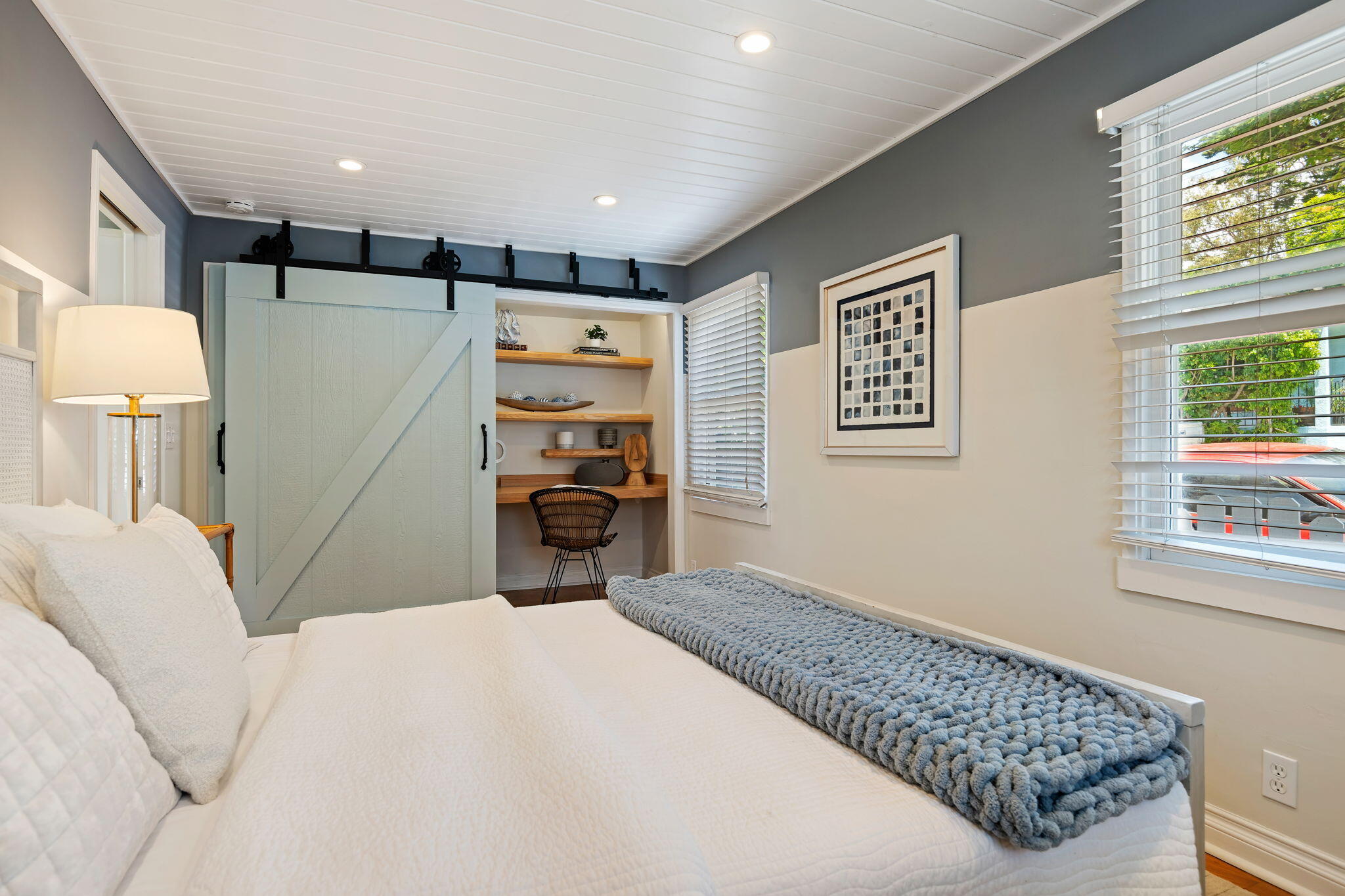 2129 Red Rose Way Santa Barbara, CA 93109 - Photo 28 of 44 a bedroom with a bed and a large mirror with window
