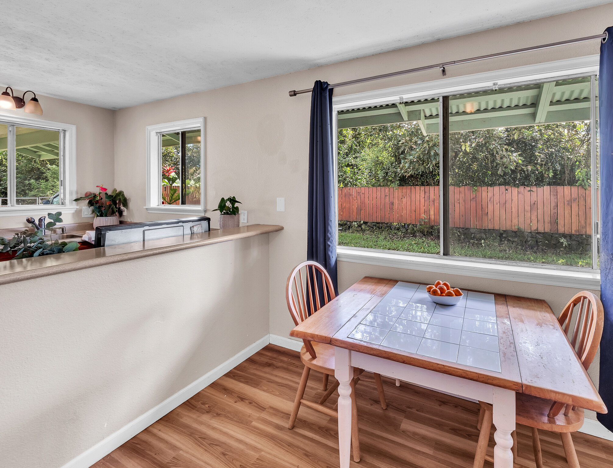 17-7658 North Kulani Road Mountain View, HI 96771 - Photo 12 of 24 a view of a room with a table and chairs