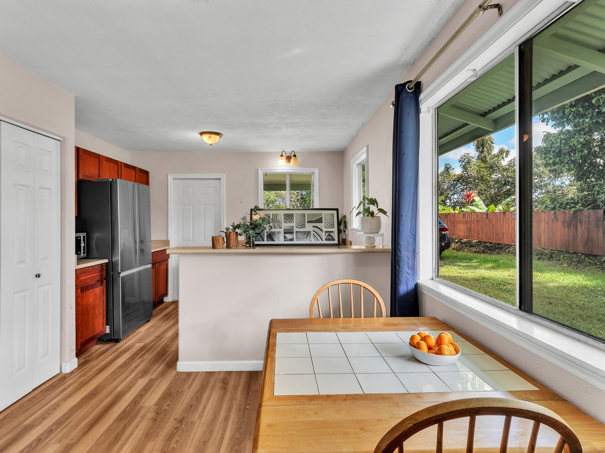 17-7658 North Kulani Road Mountain View, HI 96771 - Photo 15 of 24 a living room filled with furniture and a table