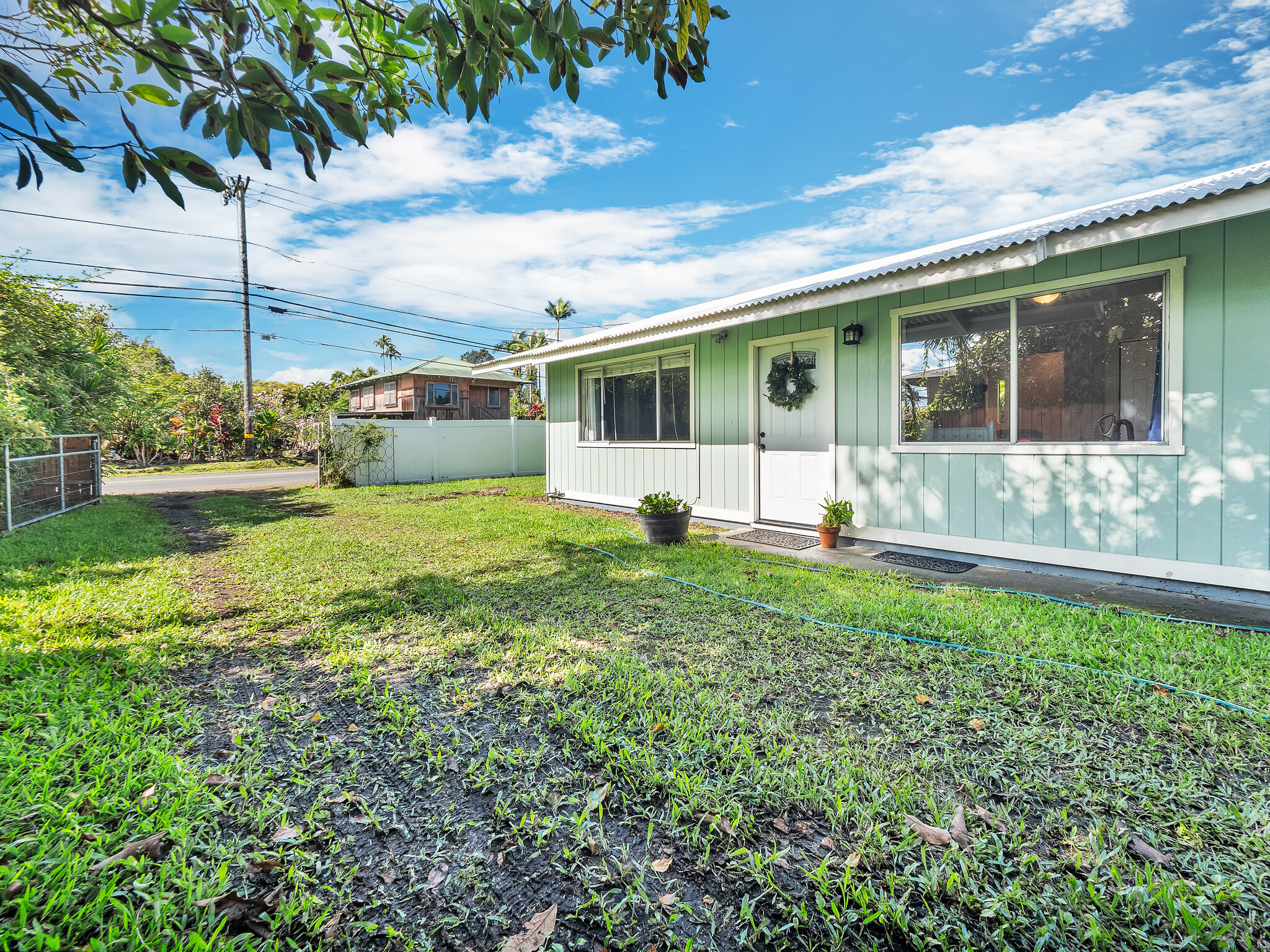 17-7658 North Kulani Road Mountain View, HI 96771 - Photo 19 of 24 a view of a house with a yard