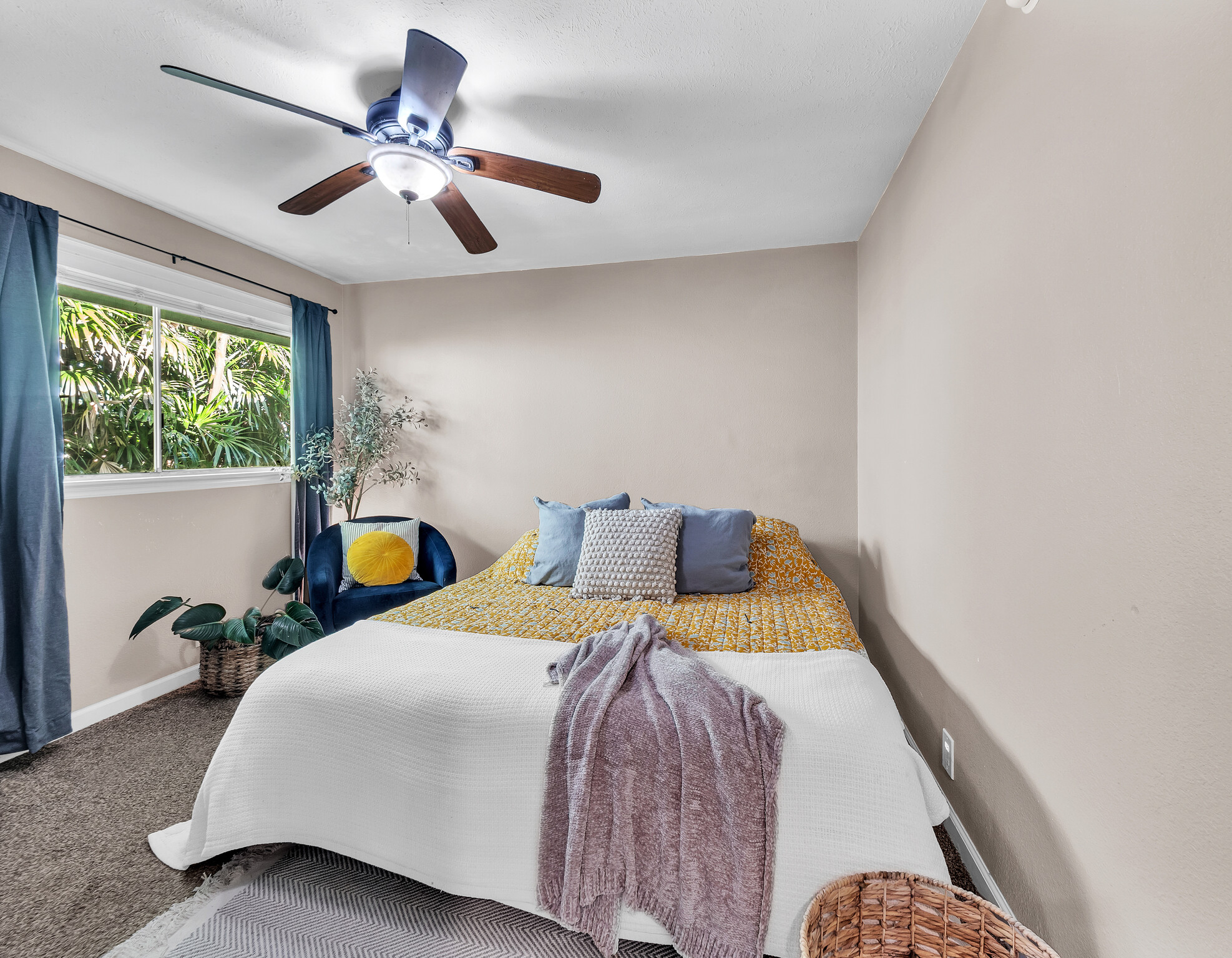 17-7658 North Kulani Road Mountain View, HI 96771 - Photo 2 of 24 a bed sitting in a bedroom next to a window