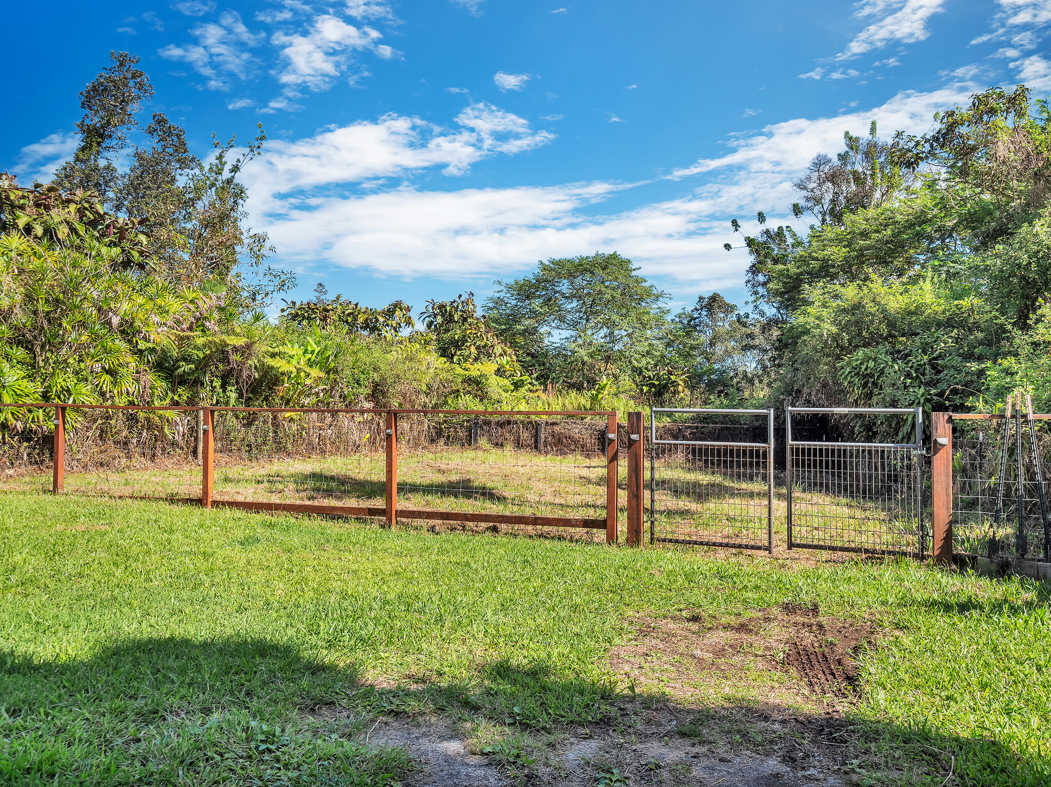 17-7658 North Kulani Road Mountain View, HI 96771 - Photo 24 of 24 a view of yard with swimming pool and green space