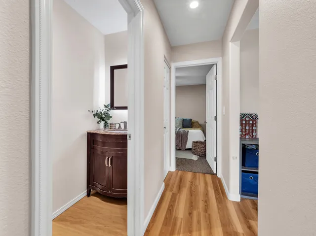 a view of a bedroom from a hallway