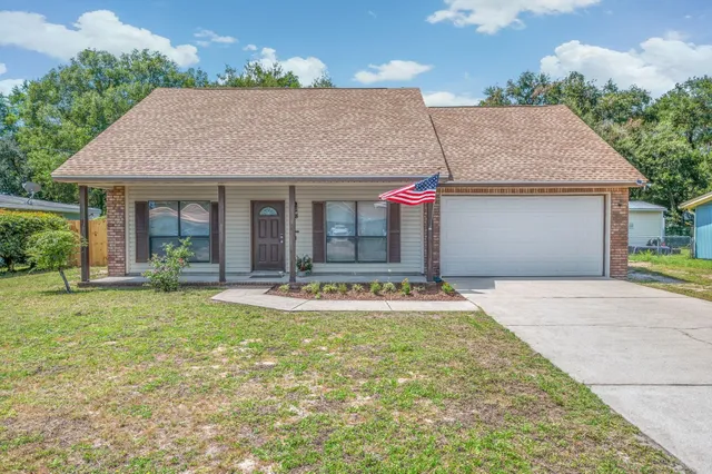 front view of house with a yard