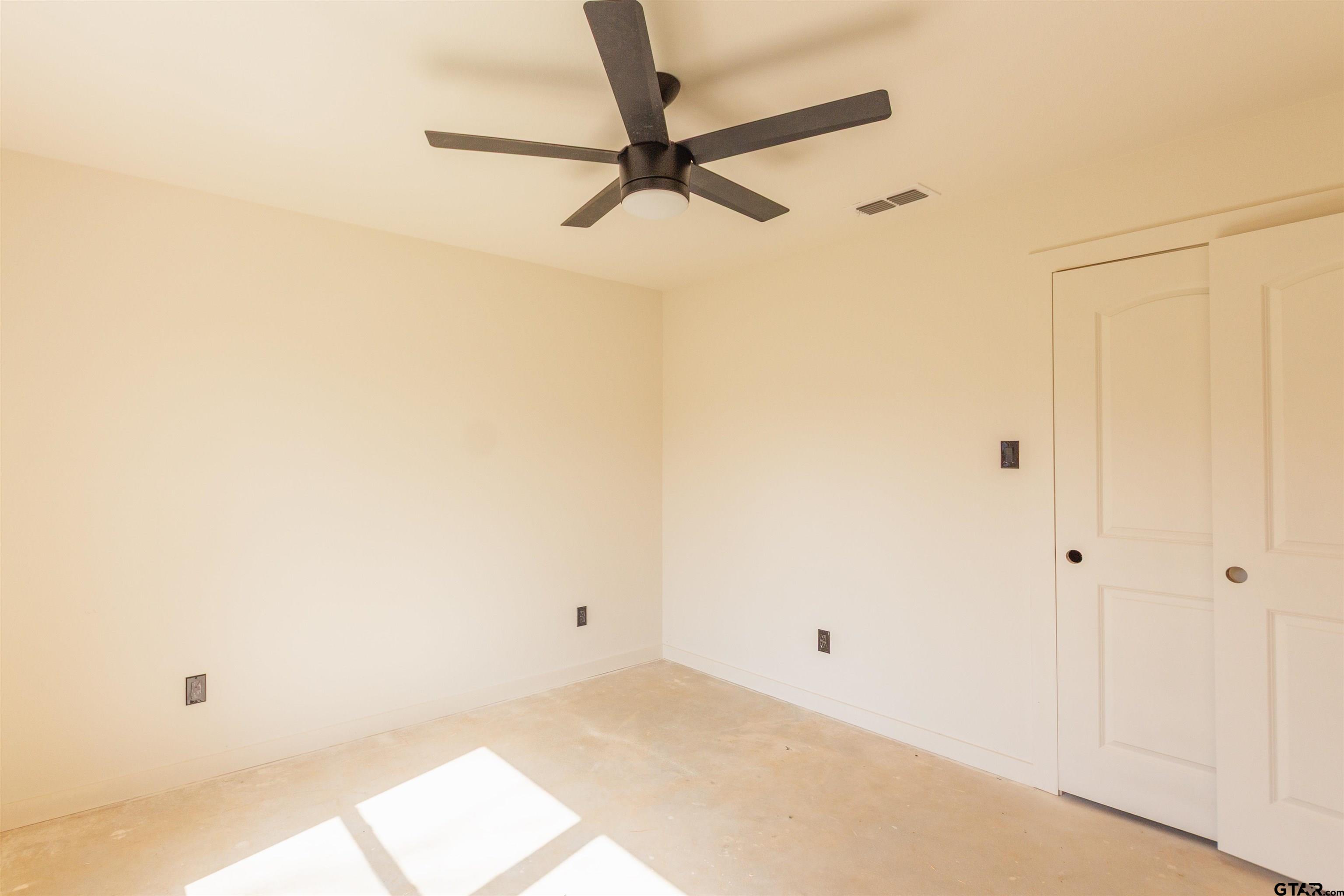 1112 Park Street Tyler, TX 75702 - Photo 15 of 26 a view of a room with a ceiling fan