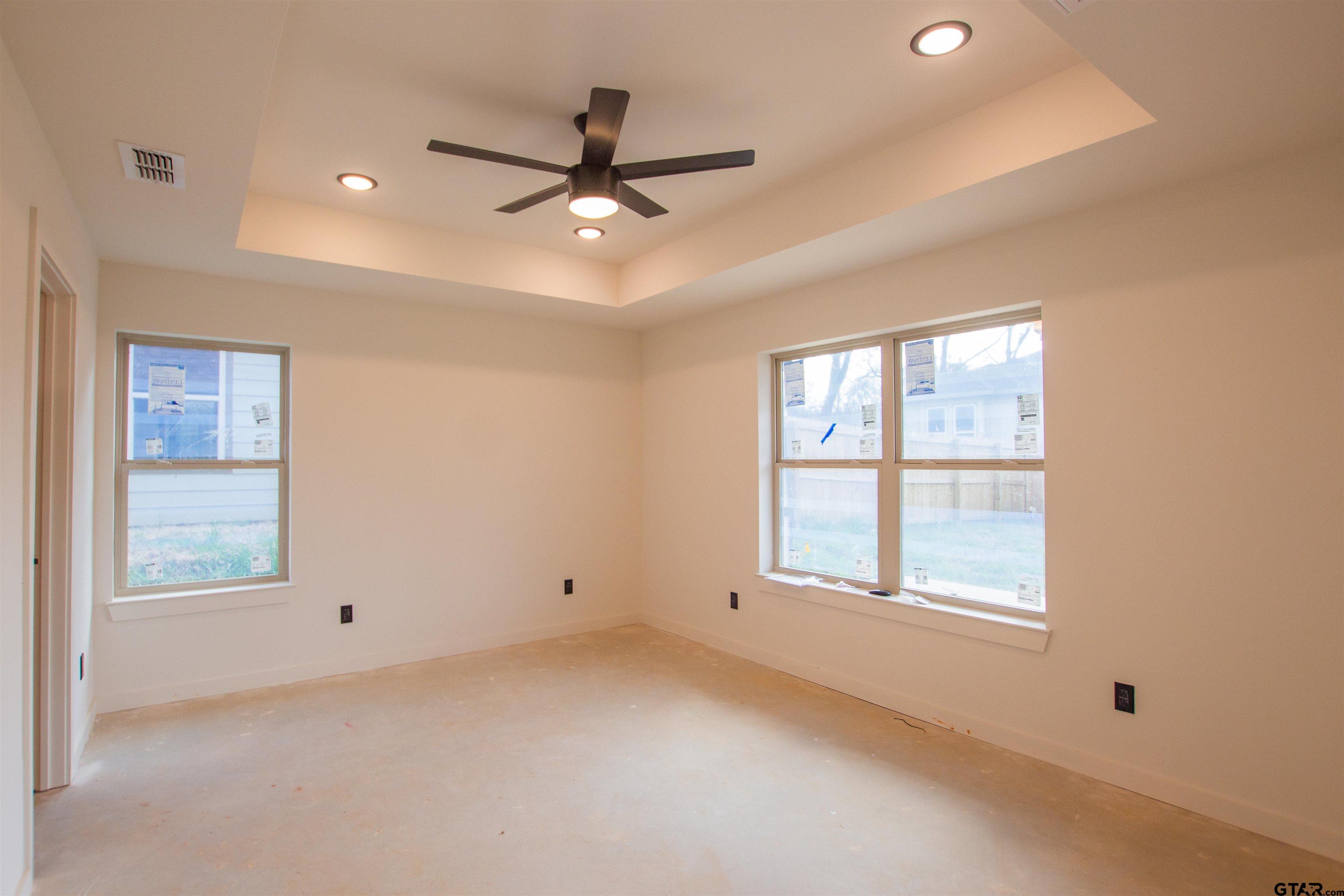 1112 Park Street Tyler, TX 75702 - Photo 17 of 26 a view of an empty room with a window