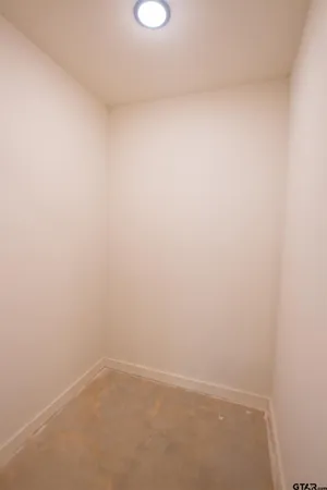 a bathroom with a toilet and a bathtub