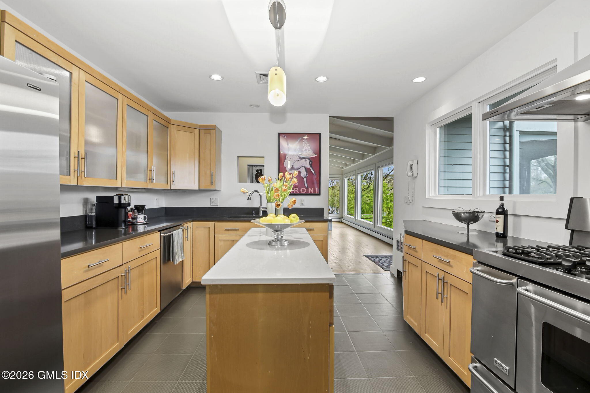185 Valley Road Cos Cob, CT 06807 - Photo 16 of 38 a kitchen with stainless steel appliances granite countertop sink stove and refrigerator