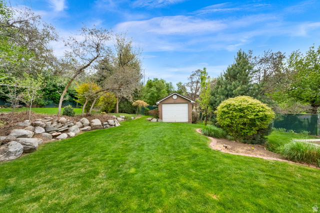 1506 Lakeview Drive Bountiful, UT 84010 - Photo 54 of 58 View of grassy yard with a workshop