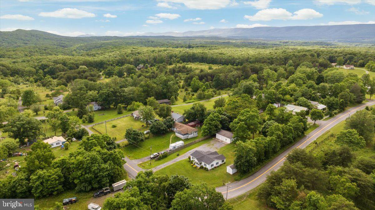 709 Dicks Hollow Road Winchester, VA 22603 - Photo 24 of 45 an aerial view of residential houses with outdoor space and trees