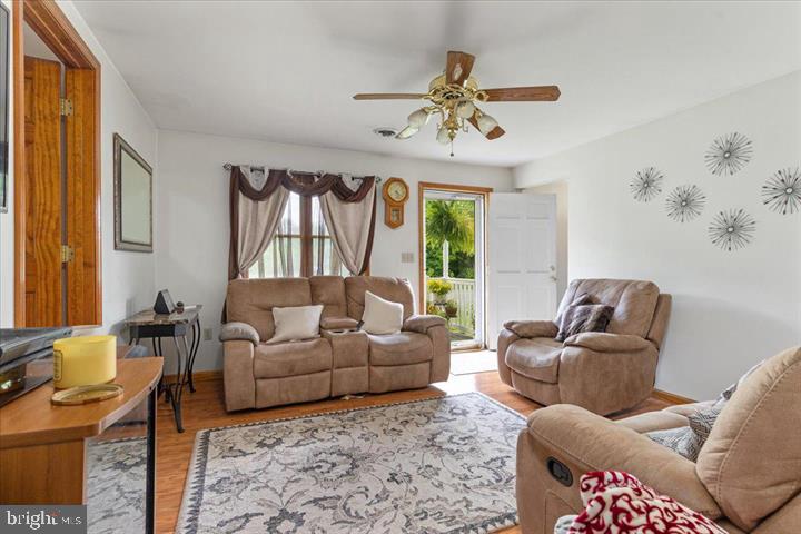 709 Dicks Hollow Road Winchester, VA 22603 - Photo 4 of 45 a living room with furniture and a large window