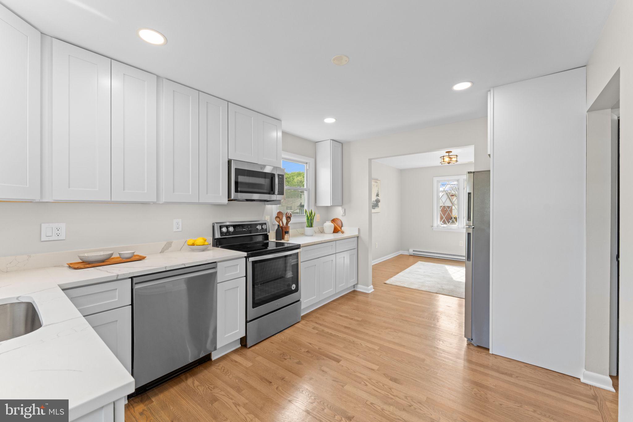 222 Chelsea Road Pasadena, MD 21122 - Photo 16 of 90 Recessed lights above and under cabinet LED lights