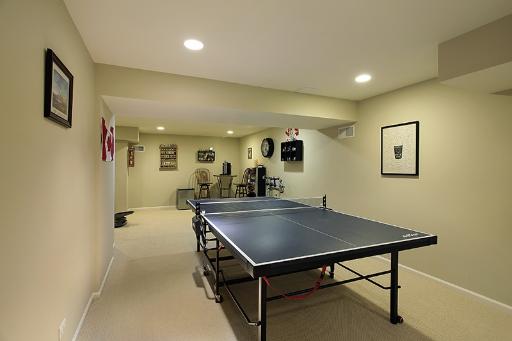 800 De Roo Loop Highwood, IL 60040 - Photo 15 of 16 a living room with table a table and potted plant