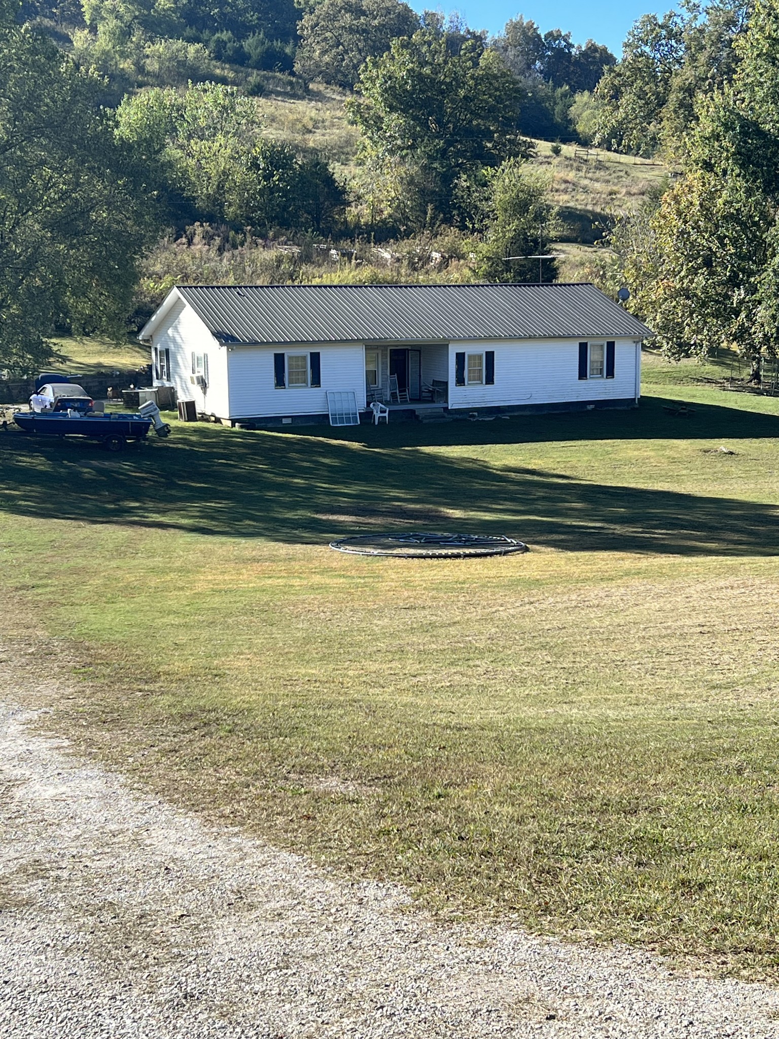 42 Edd Hackett Road Carthage, TN 37030 - Photo 3 of 10 a view of a swimming pool with an outdoor seating