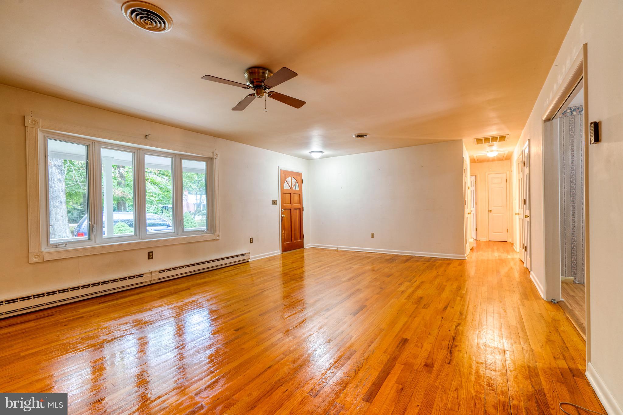 8579 Camp Road Chestertown, MD 21620 - Photo 12 of 36 Hardwood floors in family room