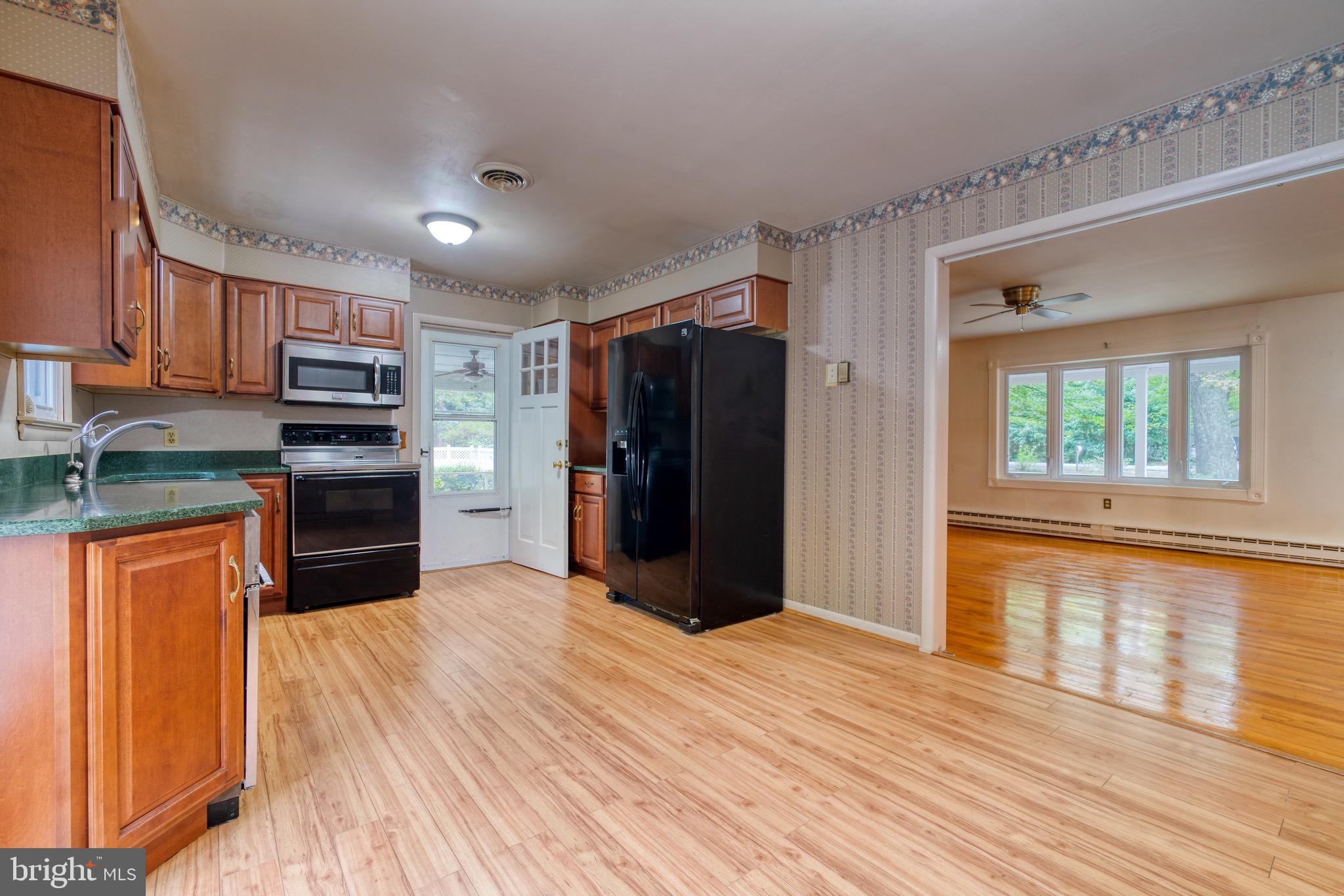 8579 Camp Road Chestertown, MD 21620 - Photo 14 of 36 Kitchen with access to patio and screened in porch