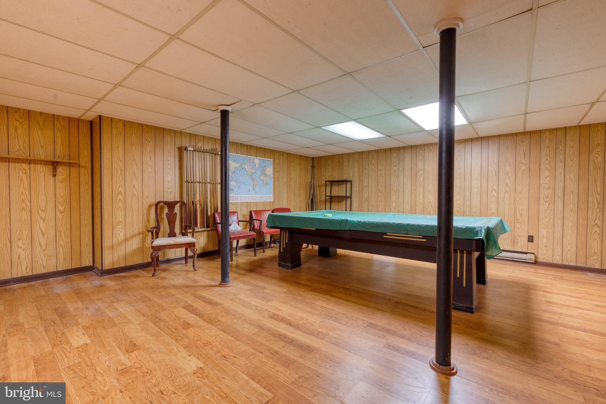 8579 Camp Road Chestertown, MD 21620 - Photo 27 of 36 Partially finished basement with pool table