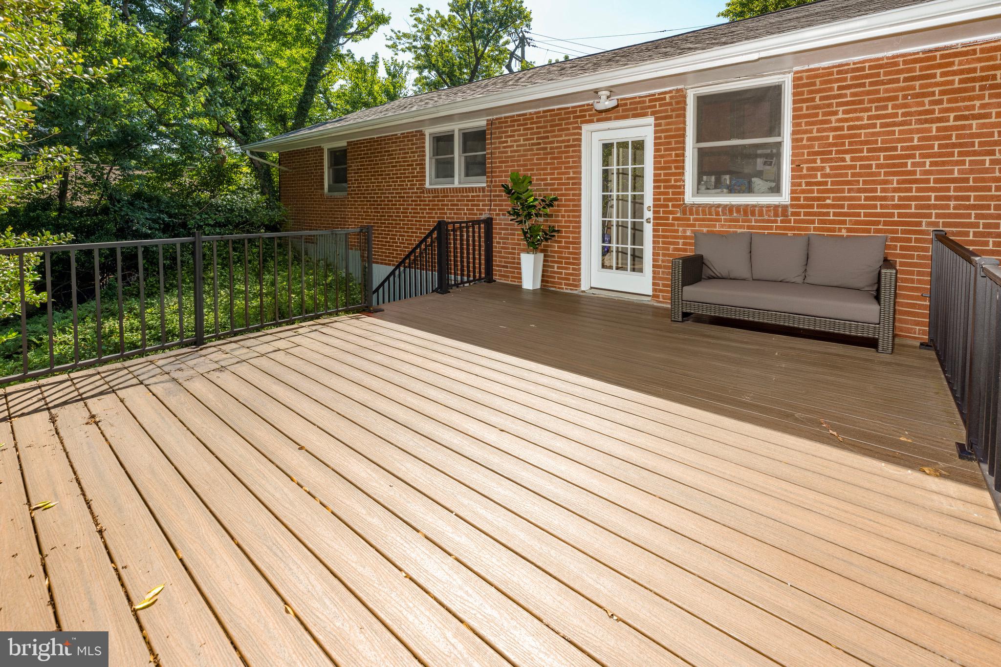 1418 Thornden Road Rockville, MD 20851 - Photo 19 of 19 a view of backyard with hardwood floor and lake view