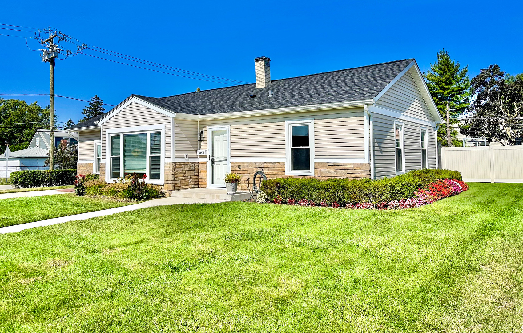 a house view with a garden space