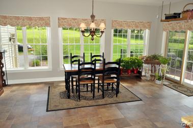 569 Bushkill Center Road Nazareth, PA 18064 - Photo 5 of 8 a dining room with furniture and a large window