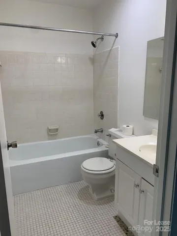 a bathroom with a sink a toilet and a bathtub