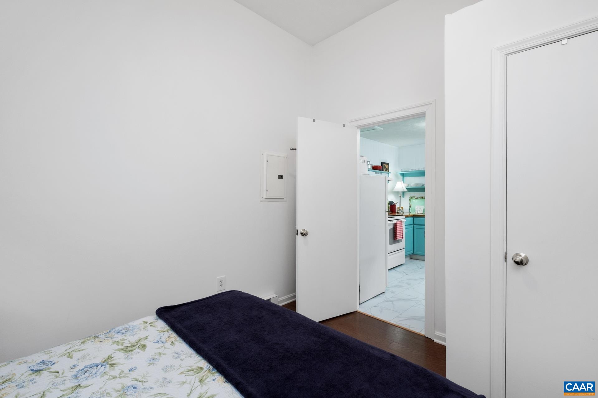 115 Circle Road Stanardsville, VA 22973 - Photo 18 of 28 a view of hallway with wooden floor and bedroom