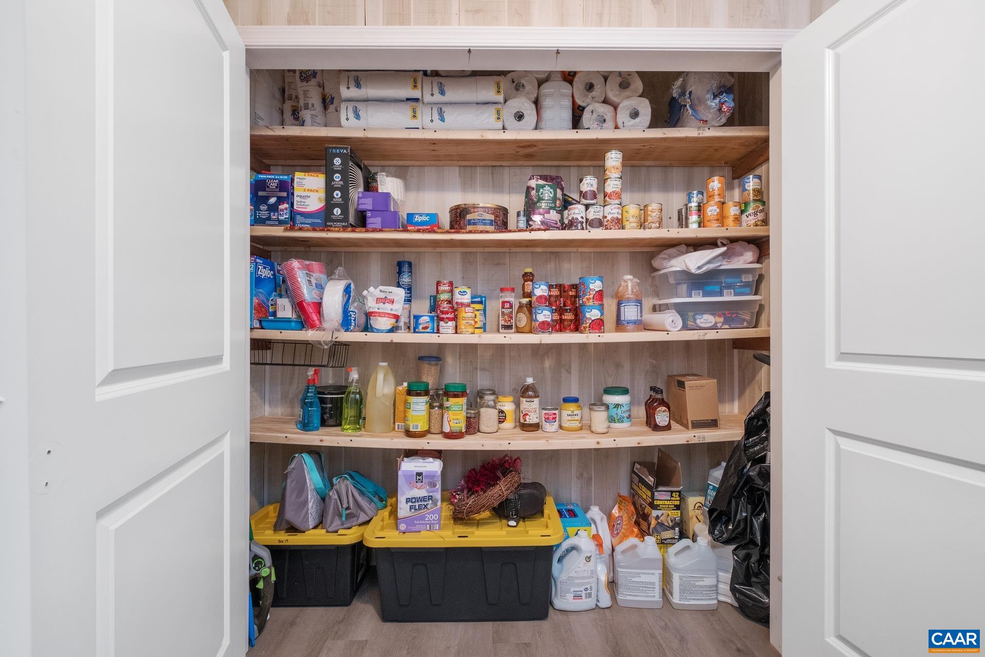 115 Circle Road Stanardsville, VA 22973 - Photo 21 of 28 a shelf with cup and plates
