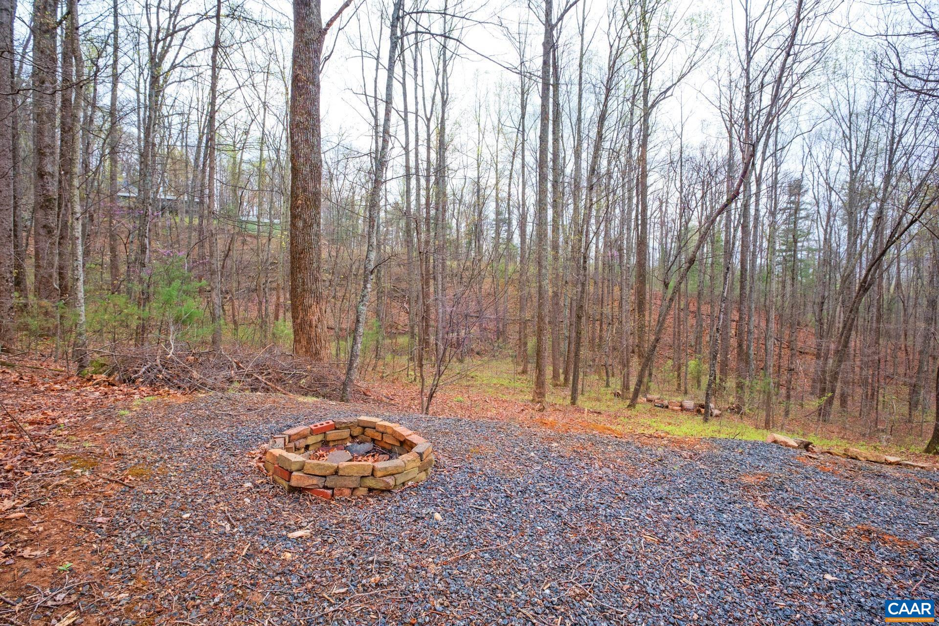 115 Circle Road Stanardsville, VA 22973 - Photo 23 of 28 a backyard of a house with lots of green space