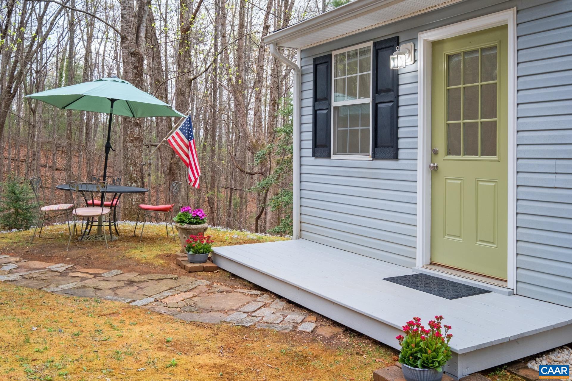 115 Circle Road Stanardsville, VA 22973 - Photo 4 of 28 a small garden in the backyard of a house