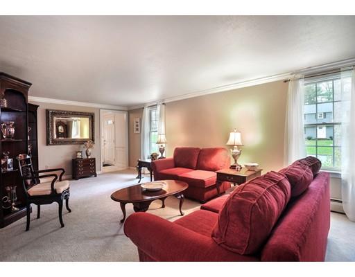 3 Flintlock Circle Hingham, MA 02043 - Photo 12 of 23 a living room with furniture and a large window