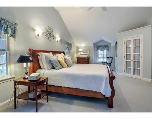 3 Flintlock Circle Hingham, MA 02043 - Photo 13 of 23 a bedroom with a bed and a table
