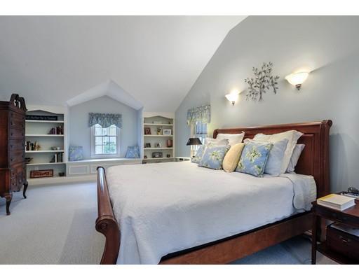3 Flintlock Circle Hingham, MA 02043 - Photo 14 of 23 a bedroom with a bed a table and bookshelf